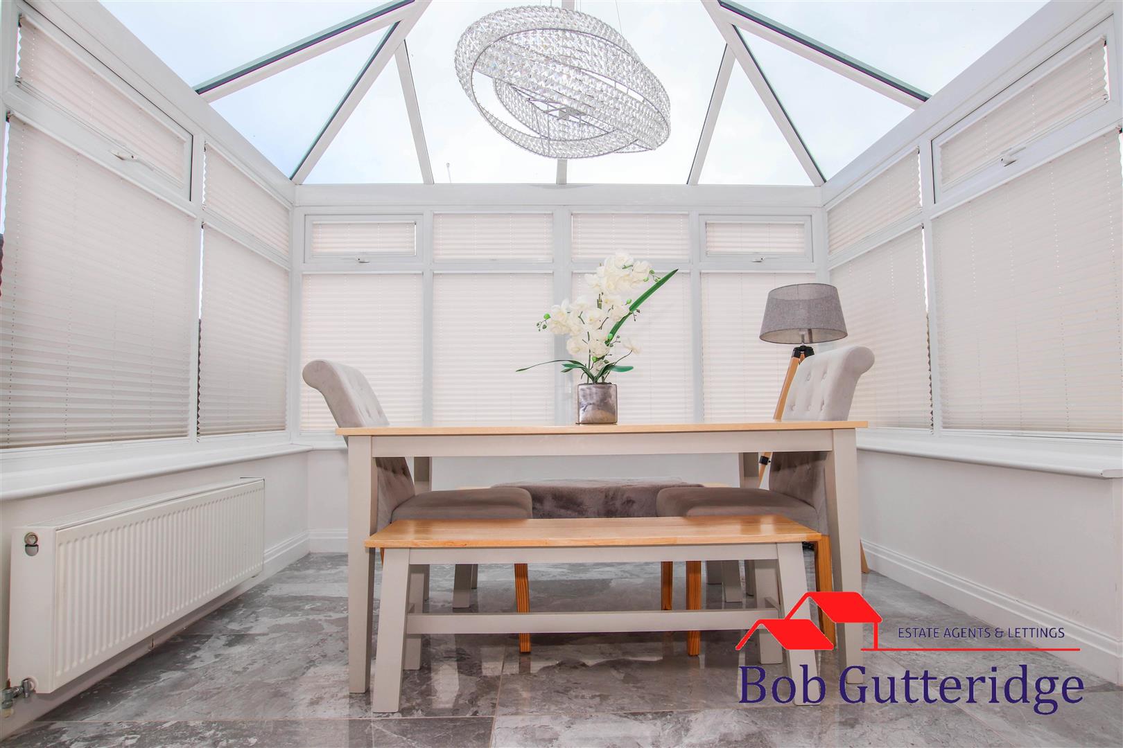 HALF BRICK & UPVC DOUBLE GLAZED CONSERVATORY